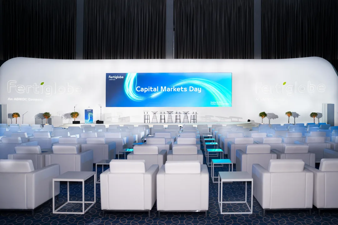 Wide-angle view of main plenary hall during Fertiglobe financial presentation