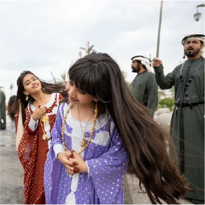 traditional-emirati-children-cultural-welcome.webp